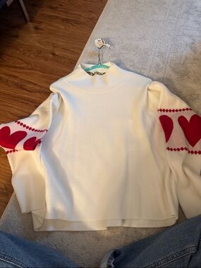 Maeve White Sweater with Red Heart Sleeve Accents